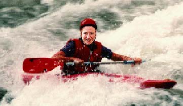 Hillary kayaking in whitewater